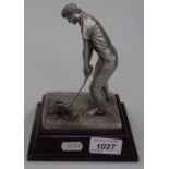 Royal Selangor pewter study of a golfer on mahogany plinth base, circa 1975, signed and dated, H7cm