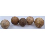 5 Antique golf balls