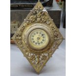 A Victorian cast-brass cased Strut clock, height 8"