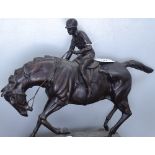 A reproduction bronze racehorse and jockey after Mene, height 13"