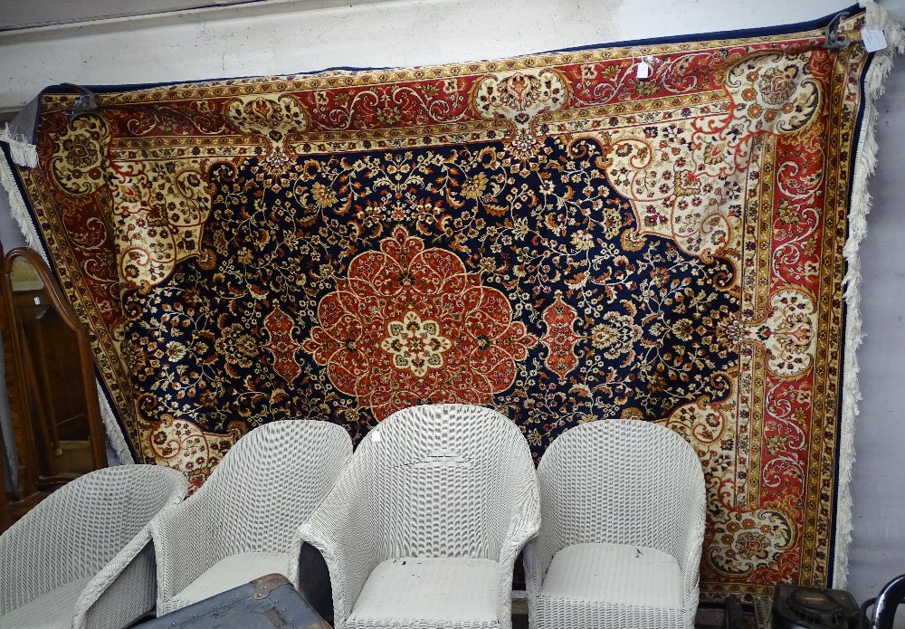 A blue ground Keshan carpet, 280cm x 200cm