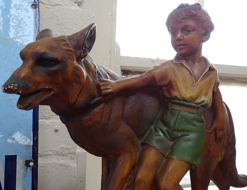 A painted plaster figure of a boy with an Alsatian, height 15.5" - Image 2 of 2