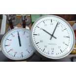 An aluminium-cased Post Office electric wall clock, diameter 12", and another electric wall clock (