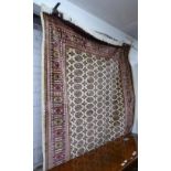 A beige ground Bokhara carpet, 230cm x 160cm