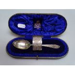 An engraved silver spoon and matching napkin ring, in original fitted case, by Read & Sons Newcastle