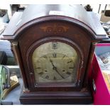 An Edwardian mahogany and marquetry inlaid dome-top mantel clock, with silver dial and 8-day