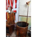 A copper swing-handled coal bucket, a church candle snuffer, and a copper hot water flagon (3)