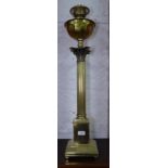 A brass Corinthian column floor standing oil lamp, H83cm