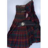 A Scottish kilt and tam o'shanter with Cameron badge