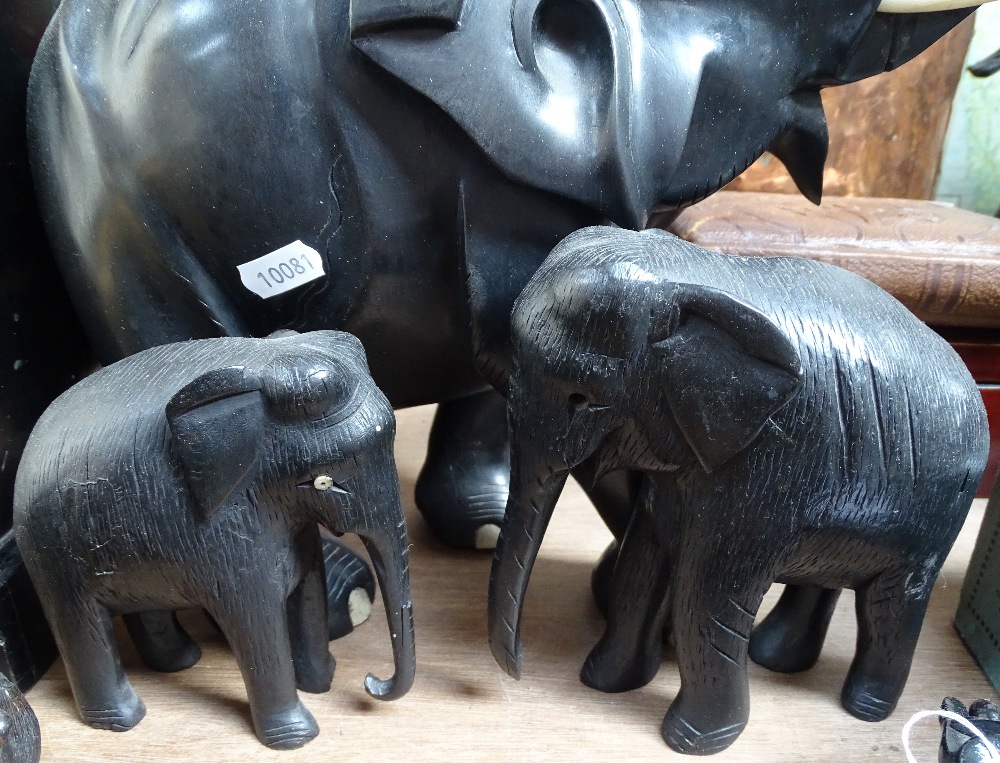 A large African carved ebony elephant, length 13", and 3 smaller elephant and hippo (4) - Image 2 of 2