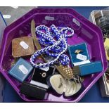 A box containing dress rings, wristwatch, beadwork belt etc