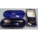 A silver fork and spoon in original presentation case, retailed by W Lister & Sons Newcastle, and