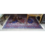 A blue ground Persian design rug, 155cm x 100cm