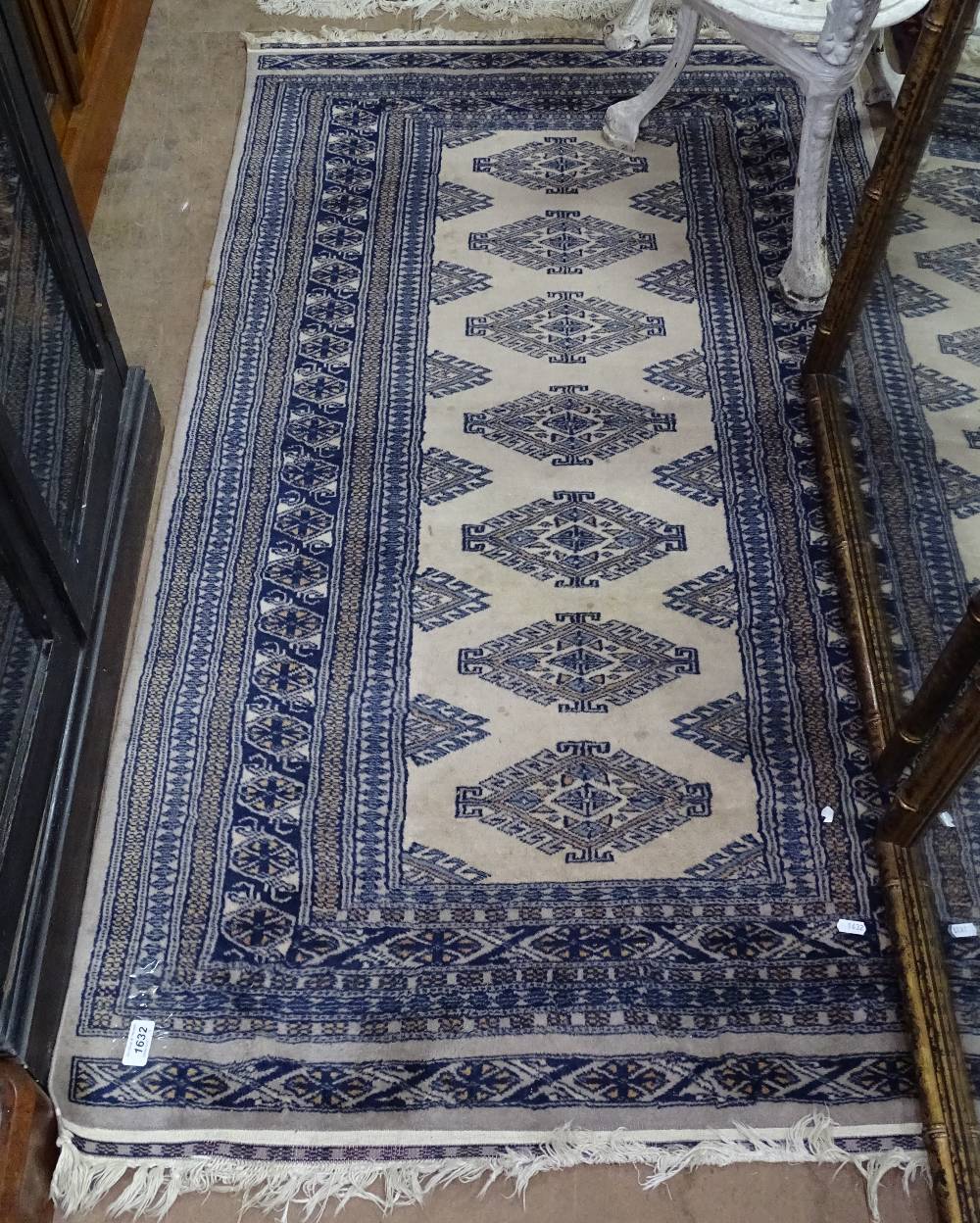 A blue ground Afghan design rug, 163cm x 93cm