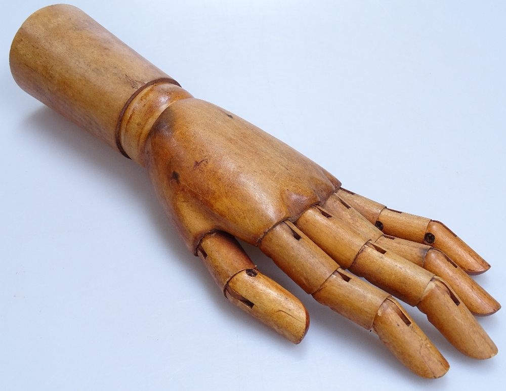 An artist's articulated lay hand, length 11"