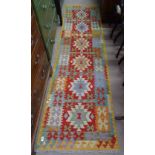 A vegetable dyed Choli Kilim runner, 295cm x 78cm