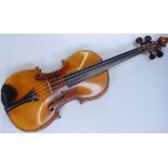 An Antique violin with label for Giacomo Luigeri dated 1913, back length 14", with wooden case and