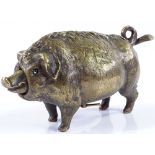 An unusual brass mechanical butcher's shop counter bell, in the form of a pig, length 16cm,