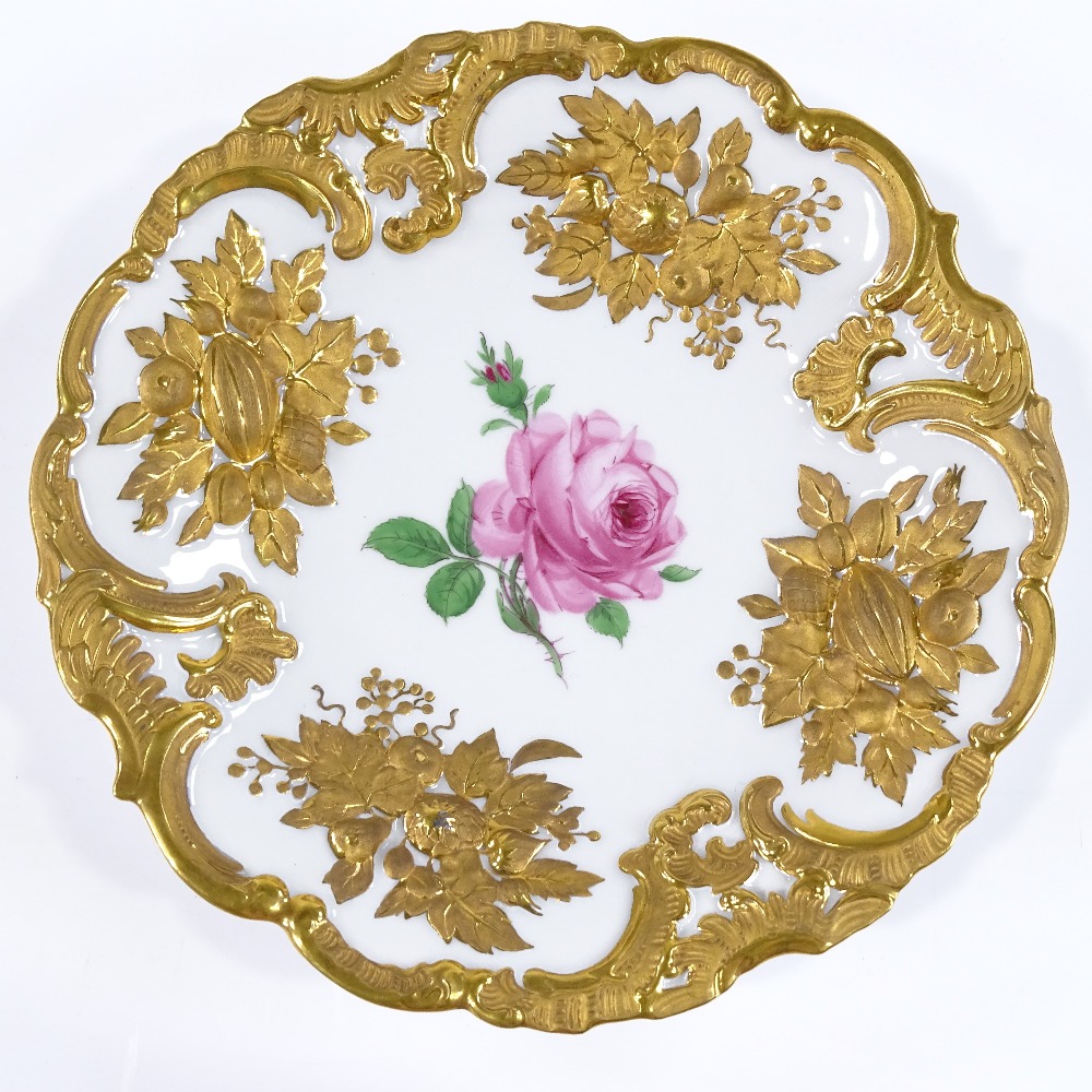 A Meissen porcelain plate with relief moulded and gilded border, and hand painted rose, diameter - Image 2 of 3