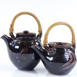 A Jim Malone Tenmoku glaze teapot with cane handle, impressed maker's marks, and another teapot,