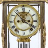 An ornate 19th century gilt-metal cased 4-glass mantel clock in Rococo style, with 8-day striking