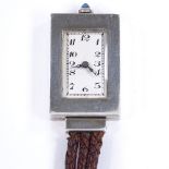 An Art Deco Swiss silver P Didisheim fob lapel watch, 15 jewel mechanical movement with green