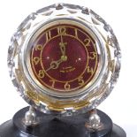 A retro Russian composition cased mantel clock, with 11 jewel movement, case diameter 15cm