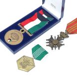 An American Military Merit medal, and Iraq medal 1991, and a Belgian Cross (3)