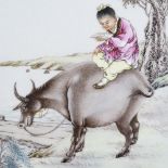 A Chinese porcelain plaque with hand painted scene depicting a figure riding a water buffalo,