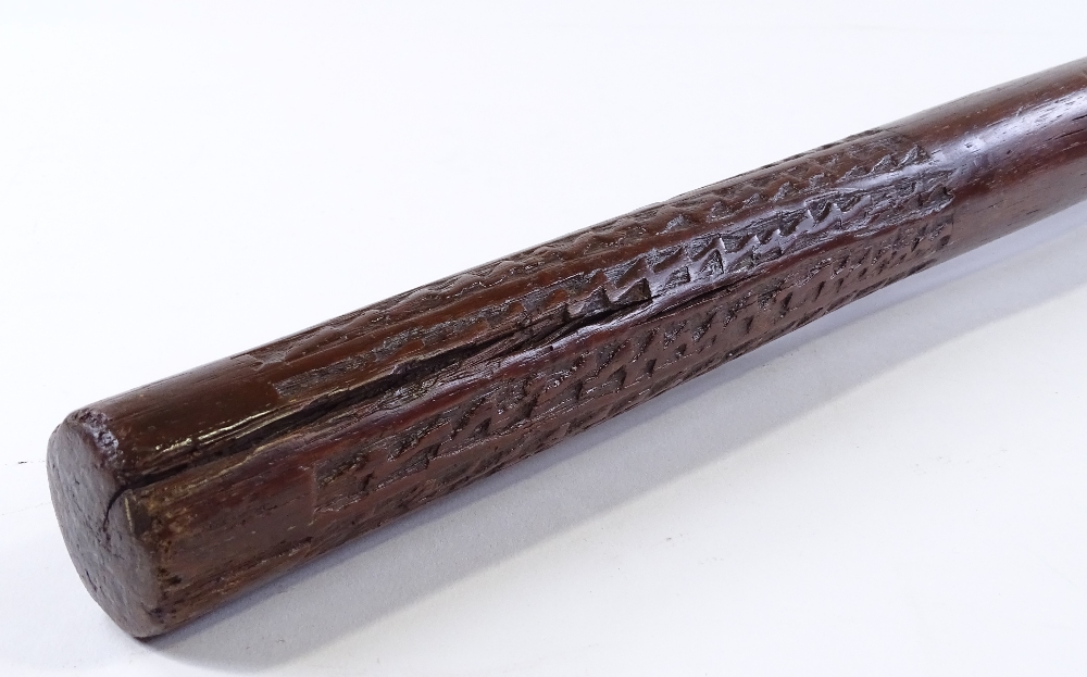 A Fiji hardwood Tribal war club, with chip carved handle and root wood head, length 100cm (3'3") - Image 3 of 3