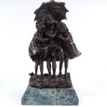 A reproduction bronze figure of 3 children under an umbrella, unsigned, on green marble base, height