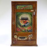 An Allwin Win a Gum Rowntree's Fruit Gums penny in the slot machine, mid-1950s, working on an old