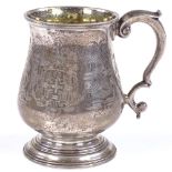 WITHDRAWN A William and Mary silver mug, of tapered bulbous form with scrolled handle...