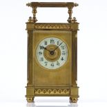 A French brass-cased carriage clock with geometric bands, case height 11.5cm, working order