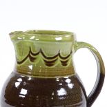 A Winchcombe Studio Pottery jug, by Ray Finch, with slip decoration, height 20cm