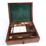 A Victorian mahogany artist's paintbox by J Newman of Soho Square, original embossed leather-lined