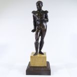 An early 19th century patinated bronze sculpture of Napoleon Bonaparte, on yellow marble and