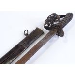 A Victorian Military Officer's dress sword, etched blade with indistinct maker's marks, brass basket