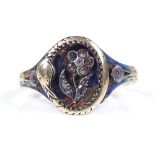 An Antique unmarked gold diamond and enamel floral signet ring, with rose-cut diamond set central