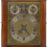 A mid-20th century reproduction bracket clock in Georgian style, with brass and silvered dial and