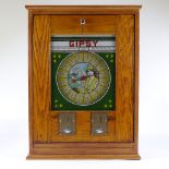 A gypsy fortune teller penny in the slot machine, re-cased original late 1950s machine working on an