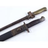 A First War Period British Military bayonet, dated 1907, original brass and leather scabbard,