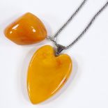 2 Baltic amber pendants, on sterling silver rope twist chain, largest pendant height 47.1mm, 32.3g