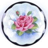 A sterling silver and enamel circular floral brooch, diameter 51.8mm, 25.2g