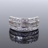 An 18ct white gold diamond set triple row half eternity cocktail ring, total baguette and round-