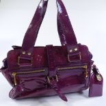 A Mulberry plum handbag, with dust bag