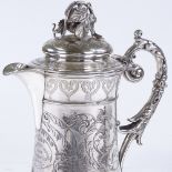 A large Victorian silver tankard, with cast-silver leaf and stem finial, engraved grapevine hinged