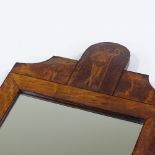 A 19th century Dutch mahogany and Classical marquetry inlaid wall mirror, height 79cm