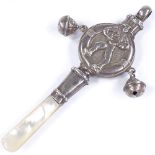 A silver baby's rattle, with mother-of-pearl teether and relief embossed sailor decoration, by