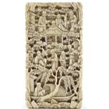 A 19th century Chinese relief carved ivory card case, decorated with figures and pagodas in gardens,